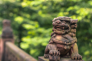Chengdu, China - August 08, 2014: Lion statue in Green Ram temple in Chengdu, China