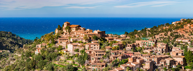 Beautiful landscape scenery with view of the old mediterranean village Deia on Majorca Spain island - 142508548