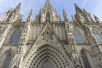 Facade of the Cathedral of Barcelona located in the old part of the city, catalonia, spain