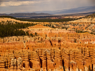Bryce Canyon National Park, a sprawling reserve in southern Utah, is known for crimson-colored hoodoos, which are spire-shaped rock formations.