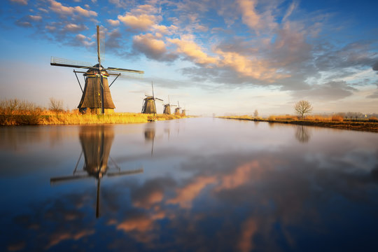 Sunset view at typical windmill at Kinderdijk, Holland.