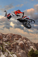 Motorcycle Rider Performing Aerial Stunt © R. Gino Santa Maria