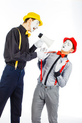 Two clown, MIME, flashy Megaphone. The expression of emotions. On a white background.
