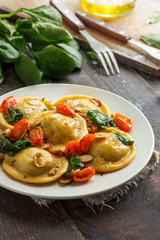 Process of cooking ravioli with spinach
