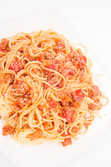 Spaghetti bolognese on a white background