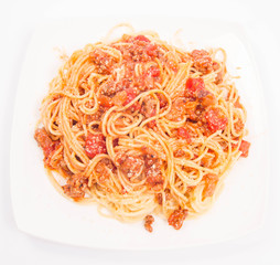 Spaghetti bolognese on a white background