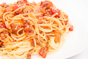 Spaghetti bolognese on a white background