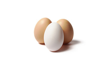 Three eggs on a white background