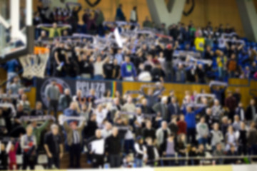 Fototapeta premium blurred background of crowd of people in a basketball court