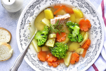 Vegetable soup with salmon.Top view.
