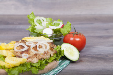 Meat grilled with salad