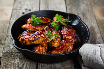 Chicken wings in cast iron skillet