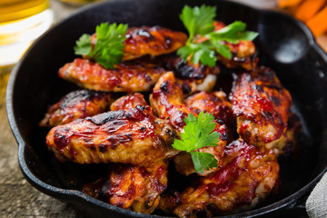 Chicken wings in cast iron skillet