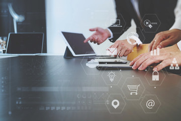 co working team meeting concept,businessman using smart phone and digital tablet and laptop computer in modern office