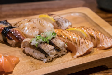 Grilled Sushi set, served on plate in a restaurant