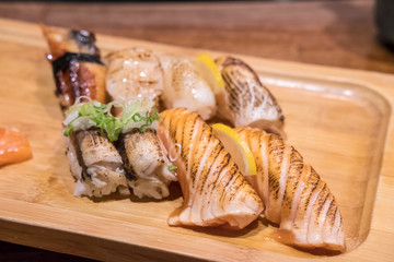 Grilled Sushi set, served on plate in a restaurant