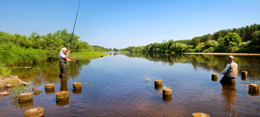 Fototapeta premium Beautiful river flowing in the countryside on a Sunny summer day