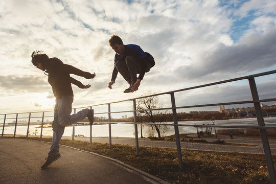 Teenagers jumping parkour