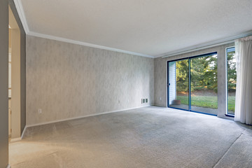 Grey empty room with metallic wallpaper