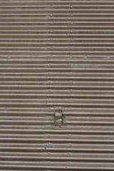 Horizontal lines of corrugated iron 