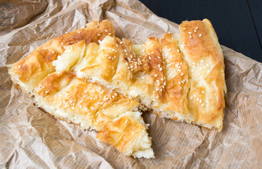 Cheese pie covered with sesame