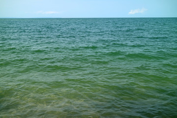 Turquoise color sea water with easy waves on the surface, Thailand 