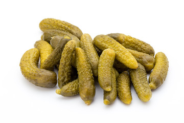 Marinated pickled cucumbers isolated on the white.