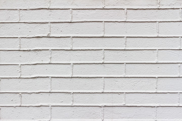 White brick wall facade for texture or background.