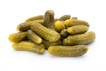 Marinated pickled cucumbers isolated on the white.