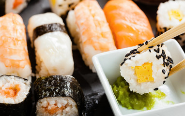 Slate tray of assorted sushi