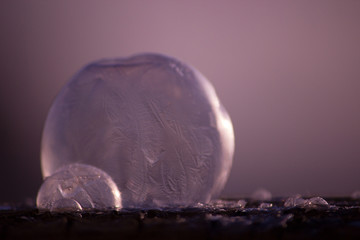 abstract winter background with frozen soap bubble