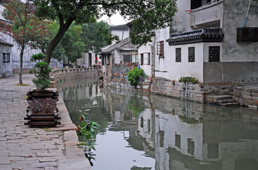 Fototapeta na wymiar China, Shanghai water village Tongli. Reflection in a typical village canal.