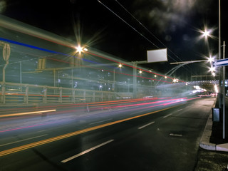 Fototapeta na wymiar Light's trails of a bus in the night