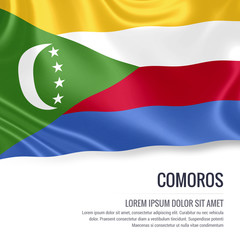 Silky flag of Comoros waving on an isolated white background with the white text area for your advert message. 3D rendering.