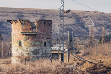 Ruined Round Brick Tower near Railway in Bulgaria