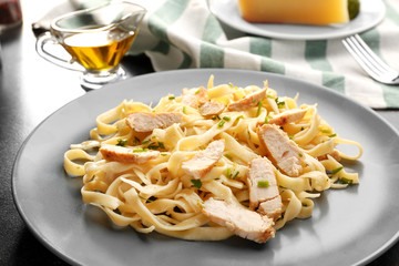 Plate with delicious Chicken Alfredo, closeup