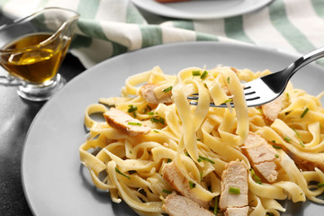 Plate with delicious Chicken Alfredo, closeup