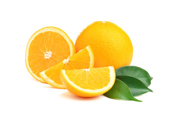 Ripe oranges with green leaves isolated on white