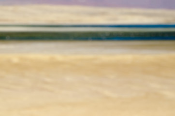 Abstract natural background - blurred view to desert and lake