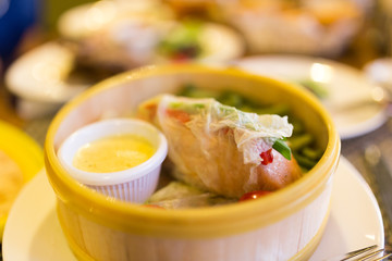Fish with vegetables in a couple in a restaurant