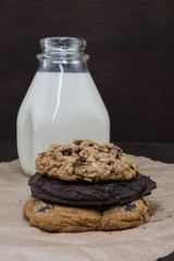 Varied Cookies in Stack with Milk