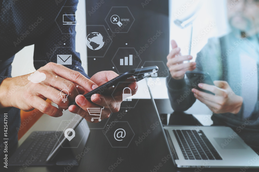 Poster co working team meeting concept,businessman using smart phone and digital tablet and laptop computer in modern office with virtual graph chart diagram