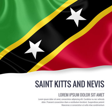 Silky flag of Saint Kitts and Nevis waving on an isolated white background with the white text area for your advert message. 3D rendering.