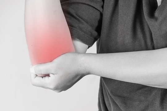 elbow injury in humans .elbow pain,joint pains people medical, mono tone highlight at elbow