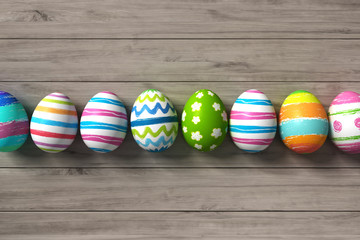 3d render of colorful painted easter eggs on wooden background