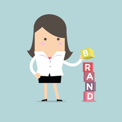 Businesswoman is building Brand cubic box puzzle, vector