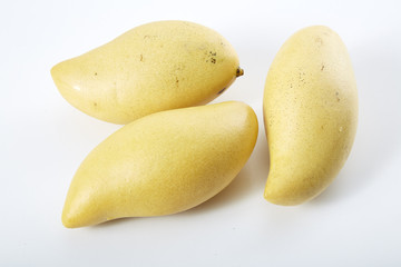 Yellow mango  on a white  background