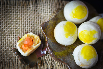 Chinese - Thai dessert Made from flour to Baking heat Mashed golden beans stuffed with salted egg yolk,Chinese festival , Traditional delicious cake in asia.