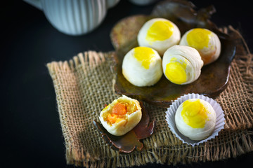 Chinese - Thai dessert Made from flour to Baking heat Mashed golden beans stuffed with salted egg yolk,Chinese festival , Traditional delicious cake in asia; soft and select focus.