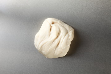 White powder for roti raw material put on the tinplate represent the Indian food background concept related idea.